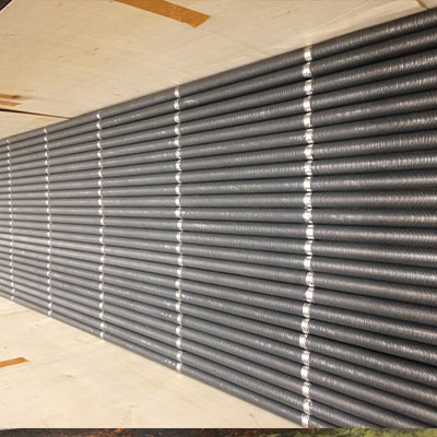 Finned tubes provided with zinc supporting rings